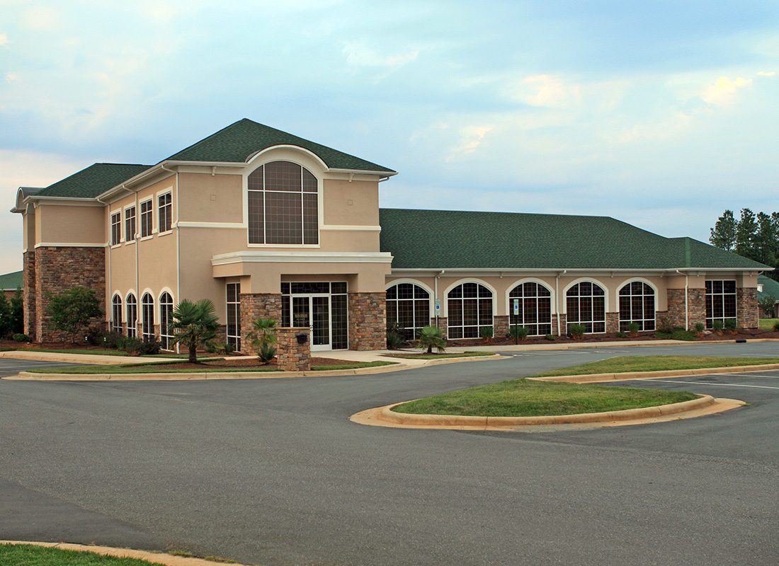 Business Insurance - Office Space With Brick Exterior and Green Roof